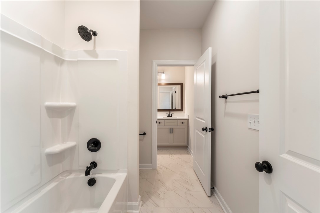 114 Lakeside Drive Anderson, SC 29621 - Photo 29 of 37 This clean and inviting bathroom features modern fixtures and a vanity with ample storage.