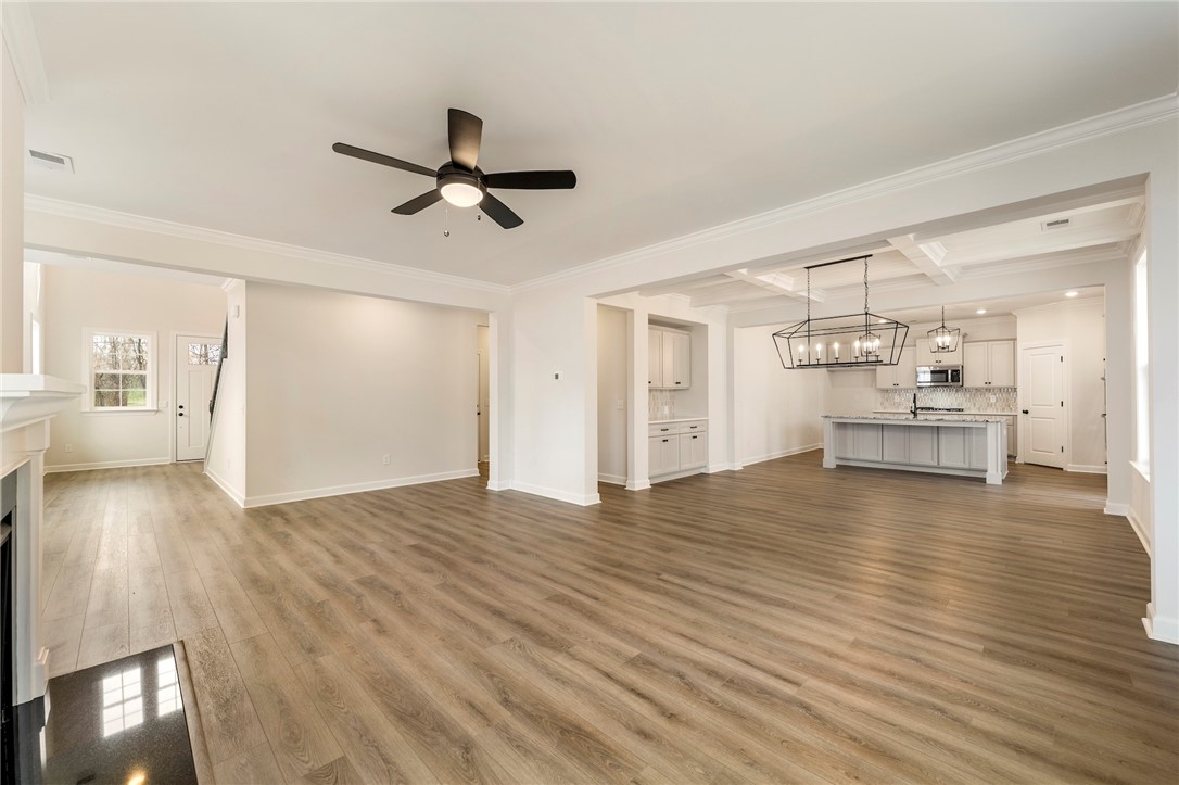 114 Lakeside Drive Anderson, SC 29621 - Photo 6 of 37 This expansive open concept living area seamlessly integrates with a gourmet kitchen, perfect for gatherings.