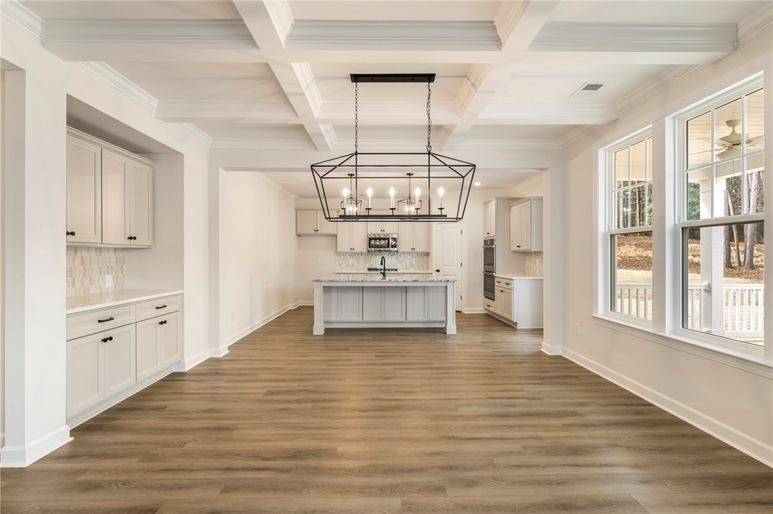 114 Lakeside Drive Anderson, SC 29621 - Photo 7 of 37 This spacious open-concept area seamlessly connects the kitchen and living space, perfect for entertaining.