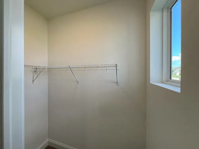 a view of a room with racks on the wall