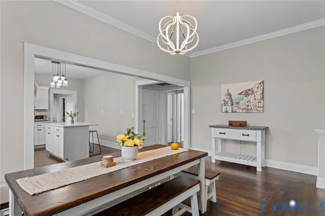 a bathroom with a sink a toilet and a window