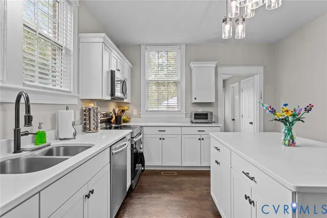 a front view of house with outdoor space and garden