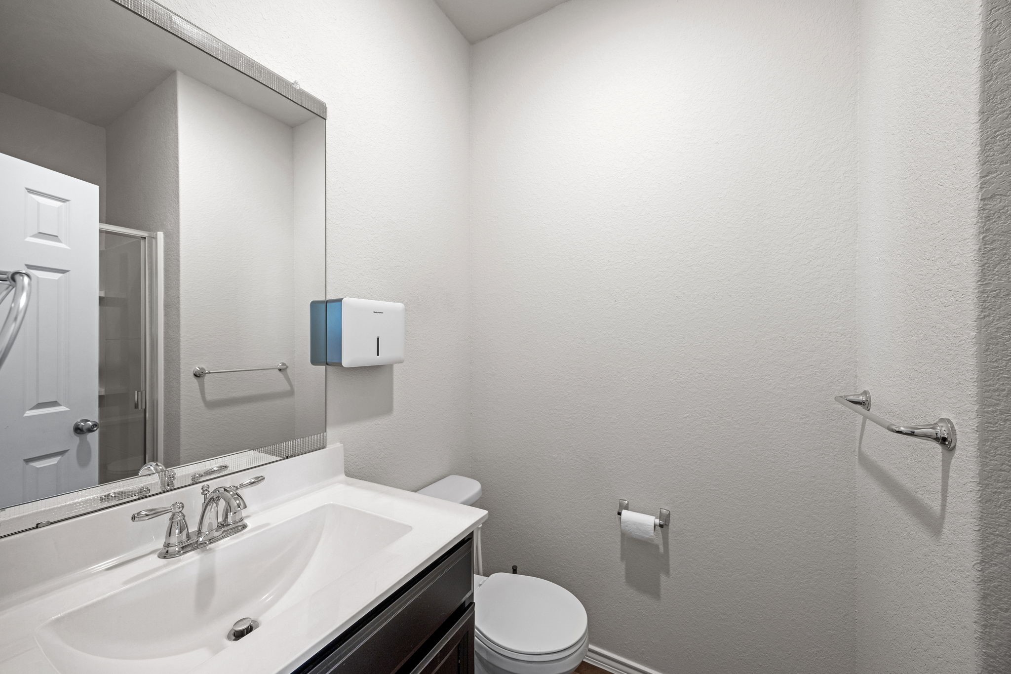 25411 Farmstead Prairie Place Katy, TX 77493 - Photo 20 of 30 a bathroom with a sink a toilet and mirror