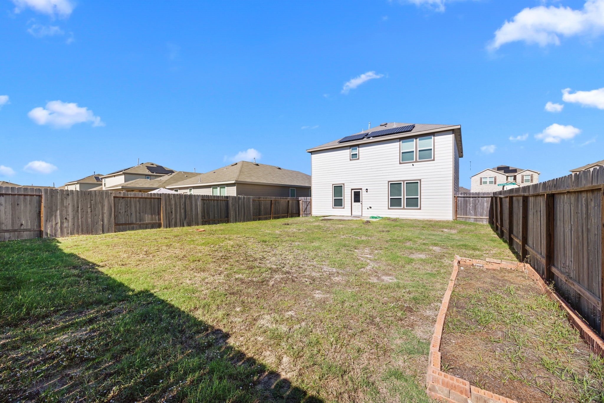 25411 Farmstead Prairie Place Katy, TX 77493 - Photo 28 of 30 a view of a house with backyard and trees