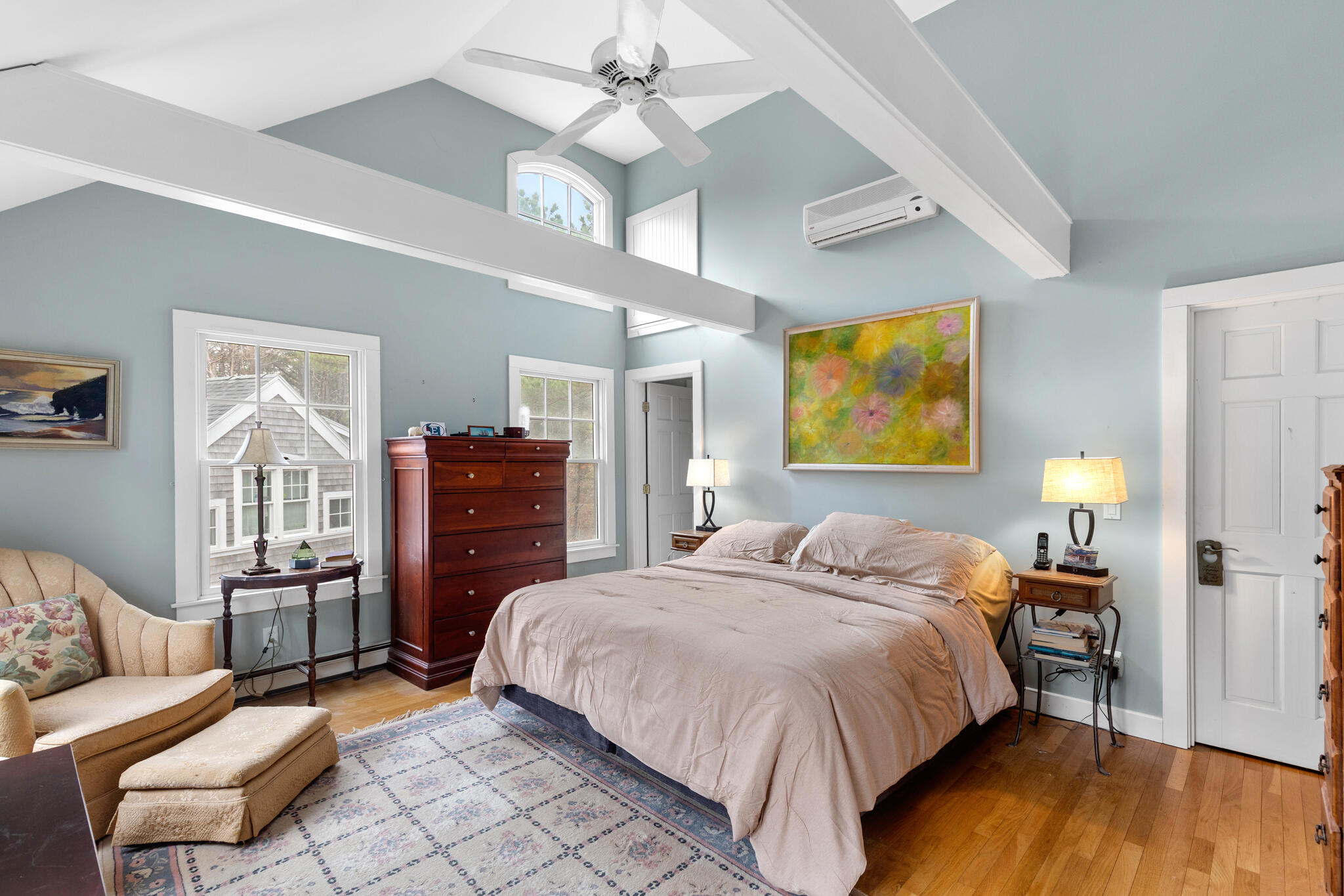 311 South Sunken Meadow Road Eastham, MA 02642 - Photo 40 of 57 a bedroom with a bed and wooden floor