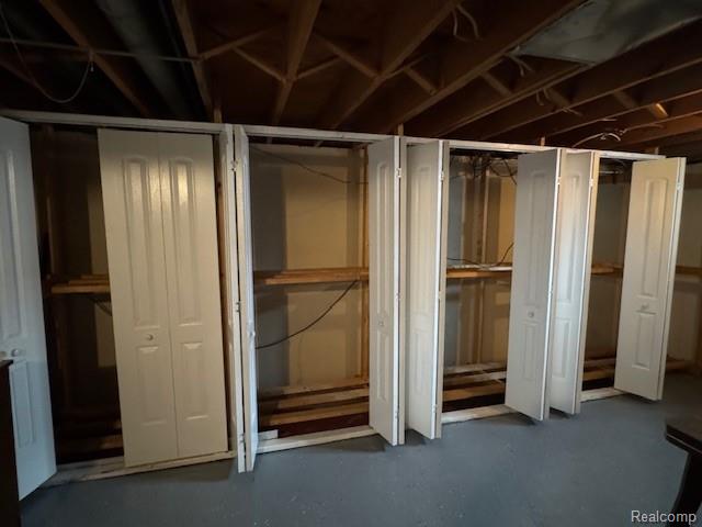 31056 Richert Street, Unit 8 Fraser, MI 48026 - Photo 18 of 19 Tons of storage/ shelve unit with doors to hide it all.