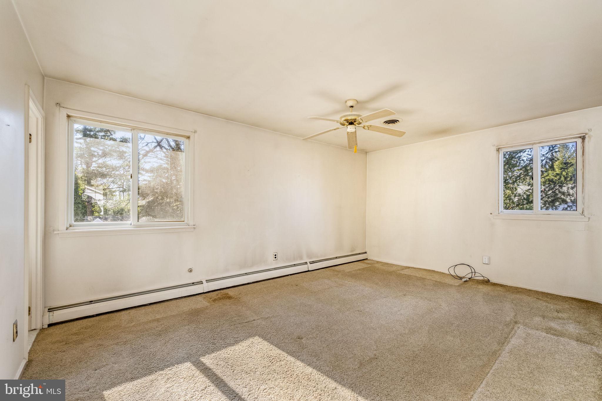 6 Morgan Road Aston, PA 19014 - Photo 13 of 33 an empty room with windows and fan