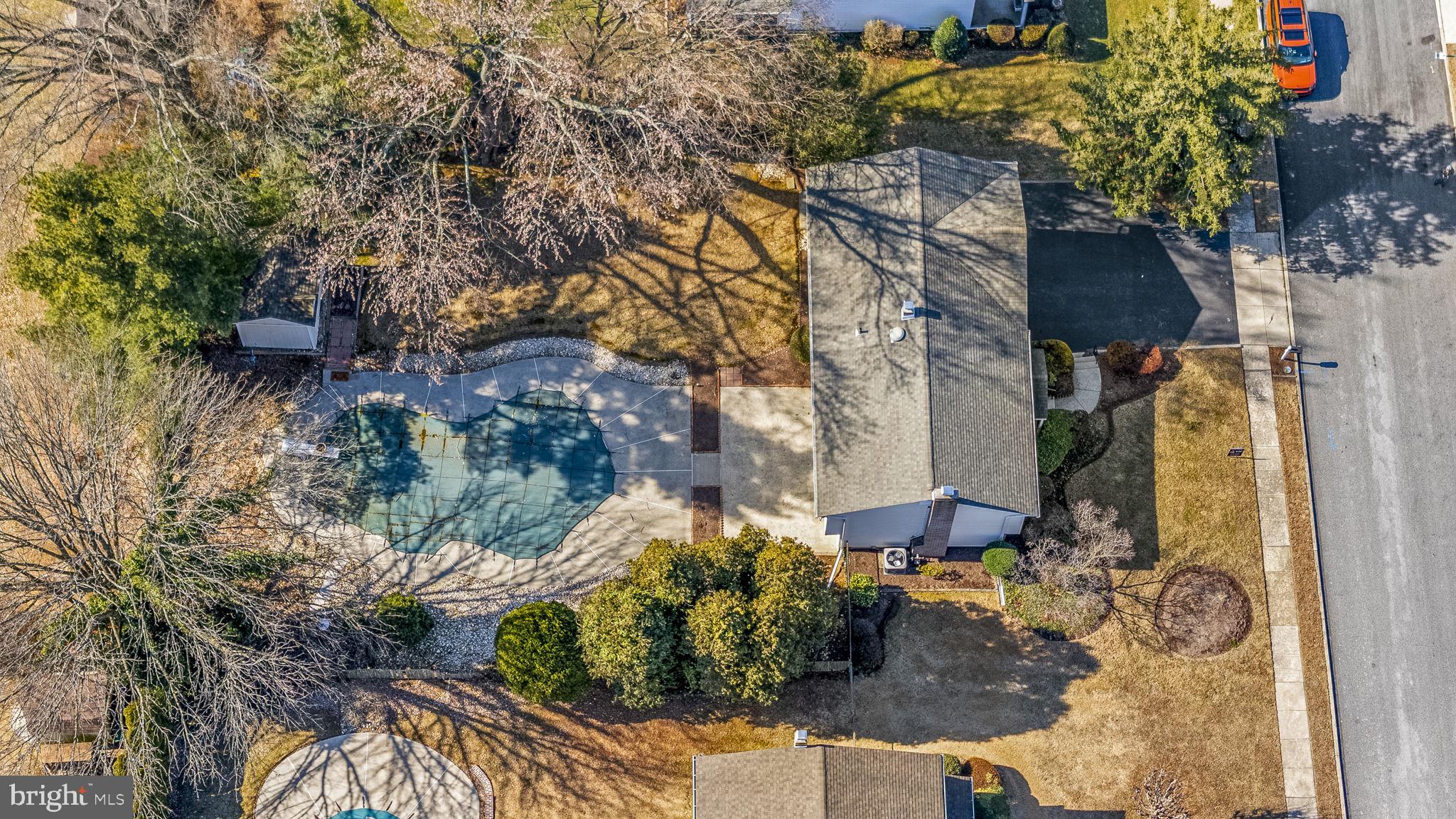 6 Morgan Road Aston, PA 19014 - Photo 31 of 33 a backyard of a house with outdoor seating