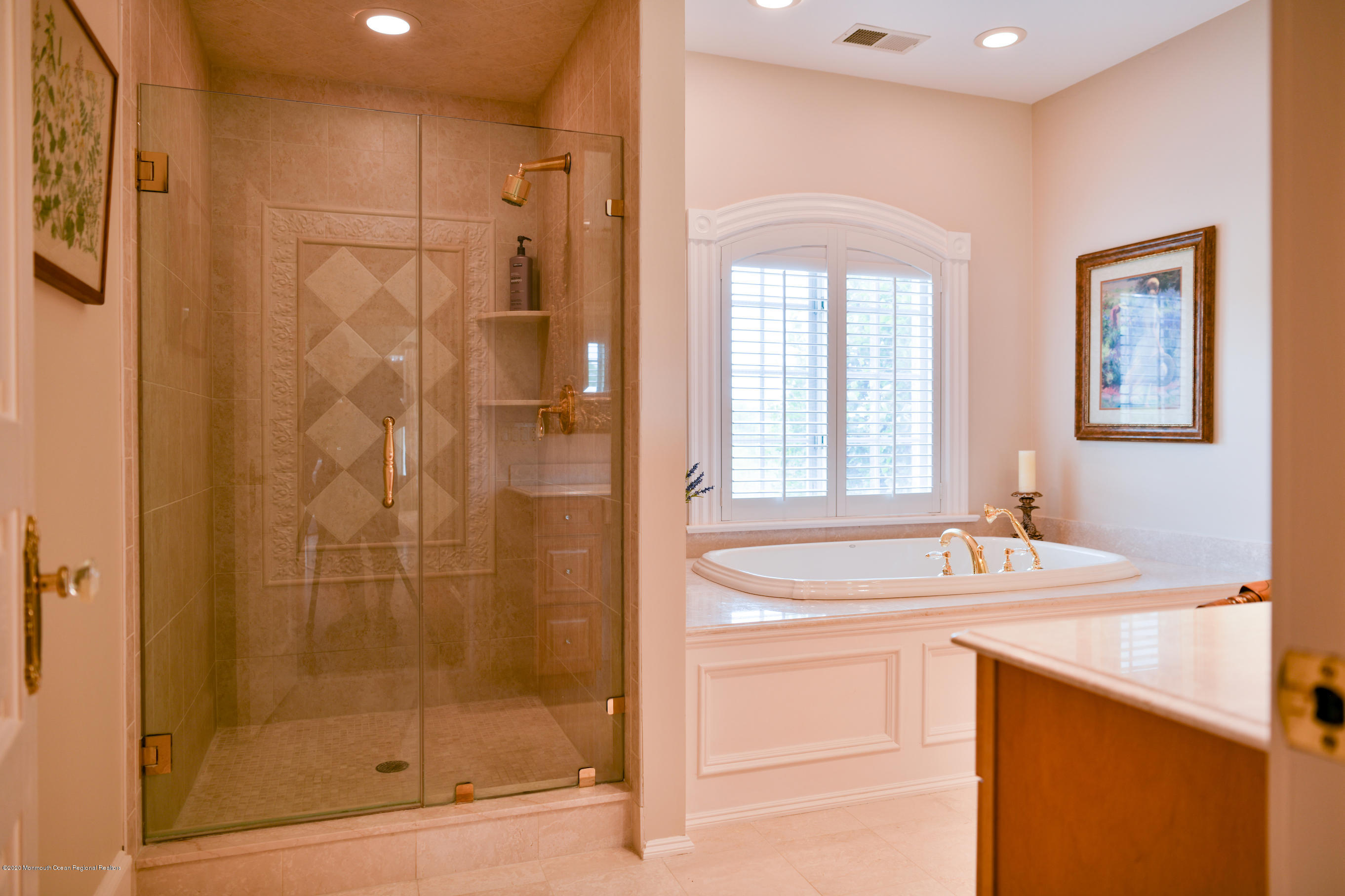 25 Ramsey Road Lebanon, NJ 08833 - Photo 19 of 49 a bathroom with a granite countertop sink a mirror a shower and a bathtub