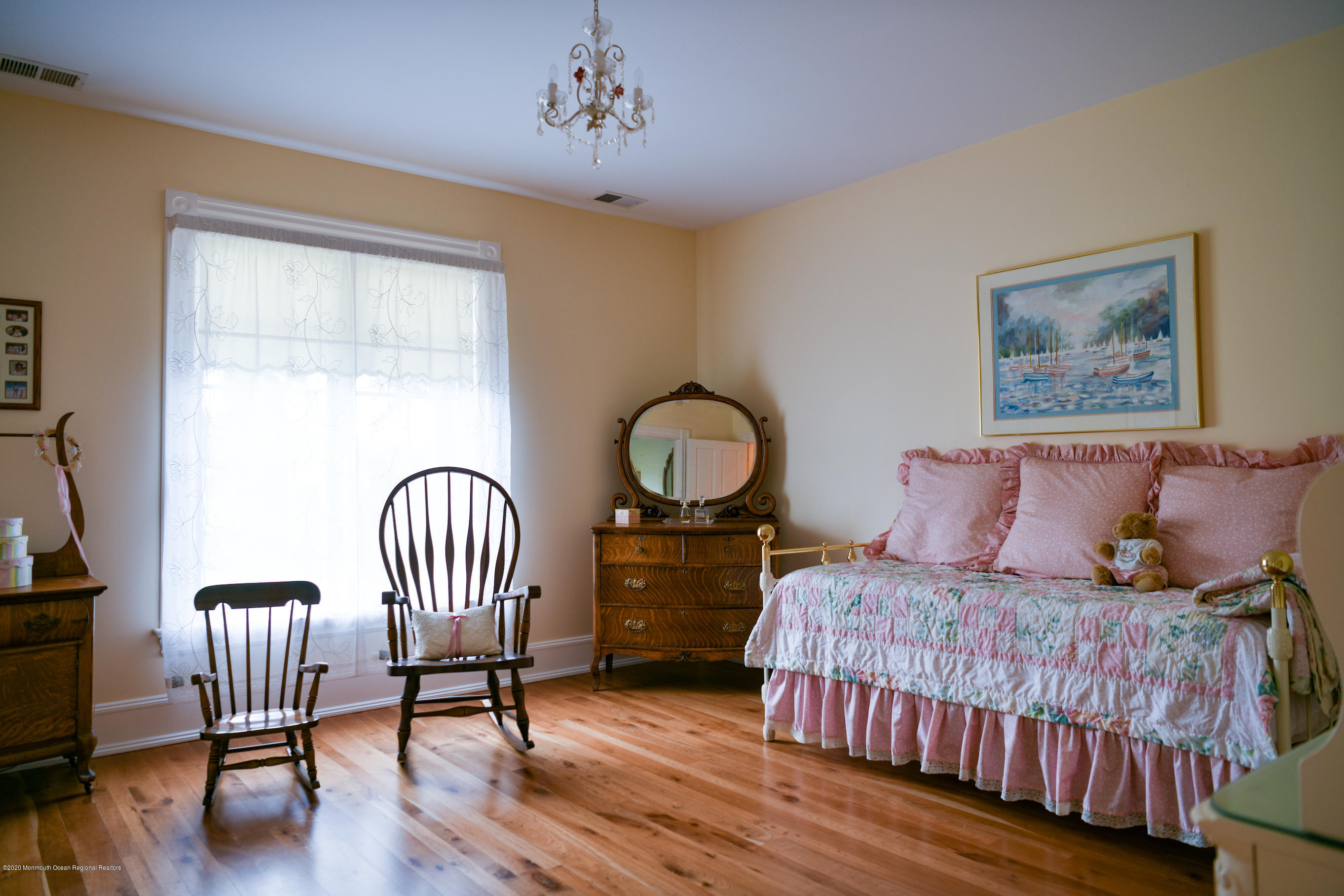 25 Ramsey Road Lebanon, NJ 08833 - Photo 25 of 49 a bedroom with a bed and a chair