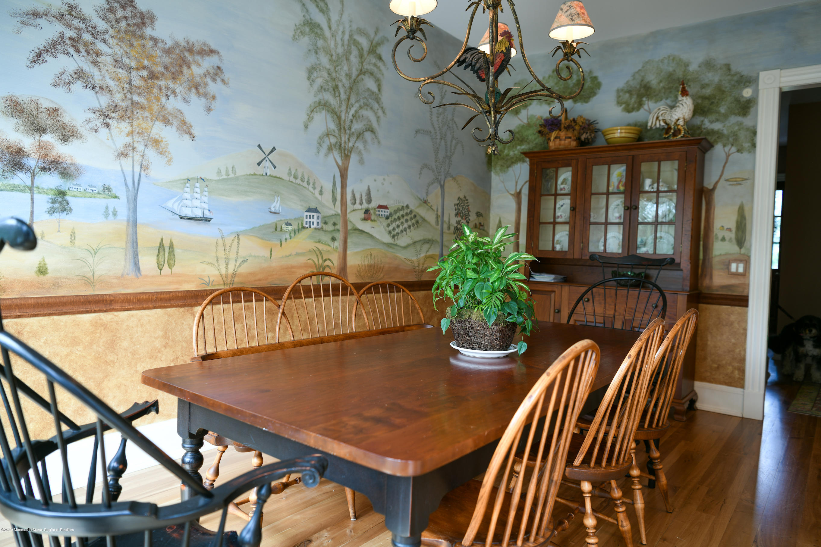 25 Ramsey Road Lebanon, NJ 08833 - Photo 9 of 49 a view of a dining room with furniture a potted plant and wooden floor