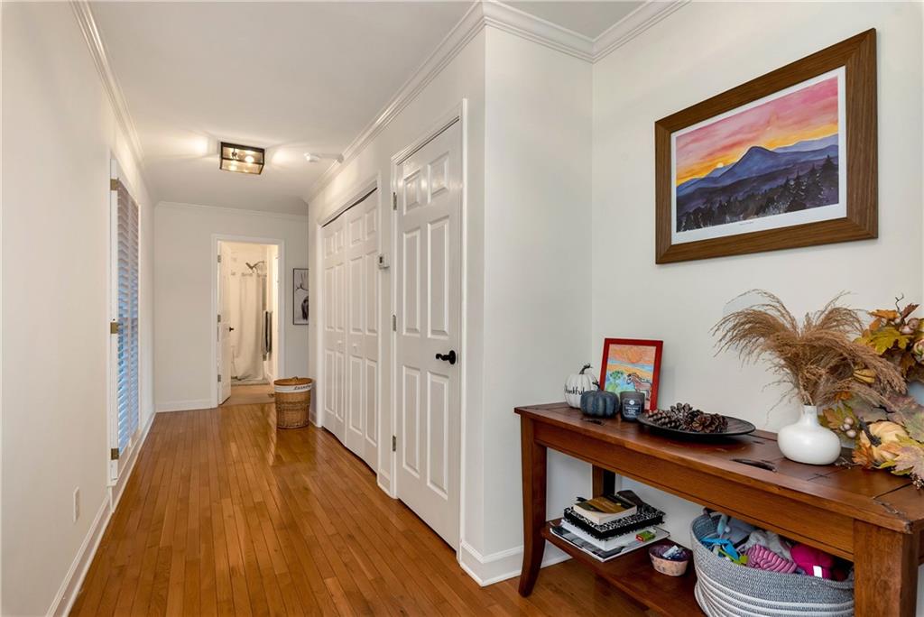 962 Woodbrier Sautee Nacoochee, GA 30571 - Photo 29 of 52 a view of a hallway with wooden floor and furniture