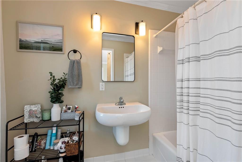 962 Woodbrier Sautee Nacoochee, GA 30571 - Photo 37 of 52 a bathroom with a sink and a mirror