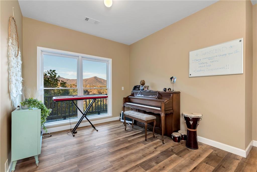 962 Woodbrier Sautee Nacoochee, GA 30571 - Photo 42 of 52 a view of a workspace with furniture and a window
