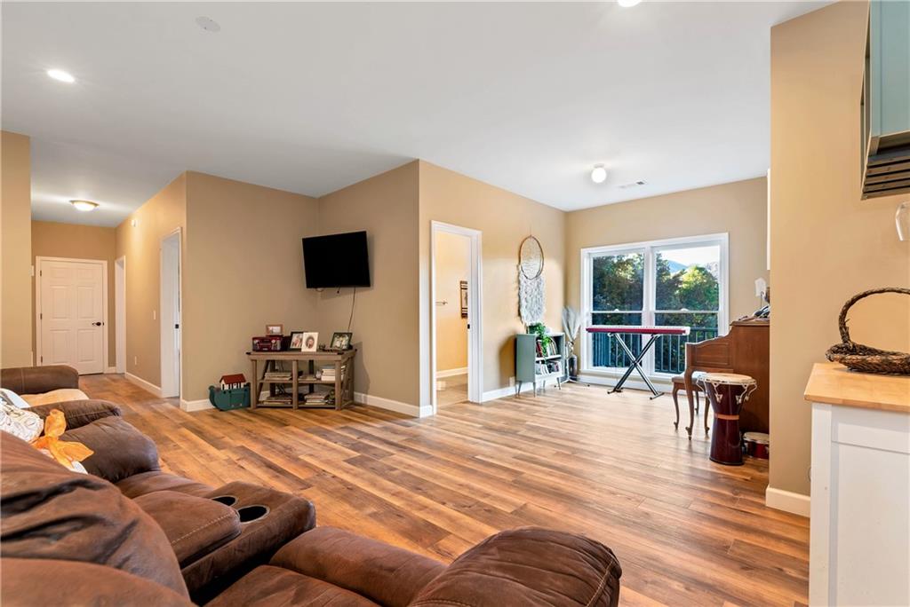 962 Woodbrier Sautee Nacoochee, GA 30571 - Photo 43 of 52 a living room with furniture and a flat screen tv