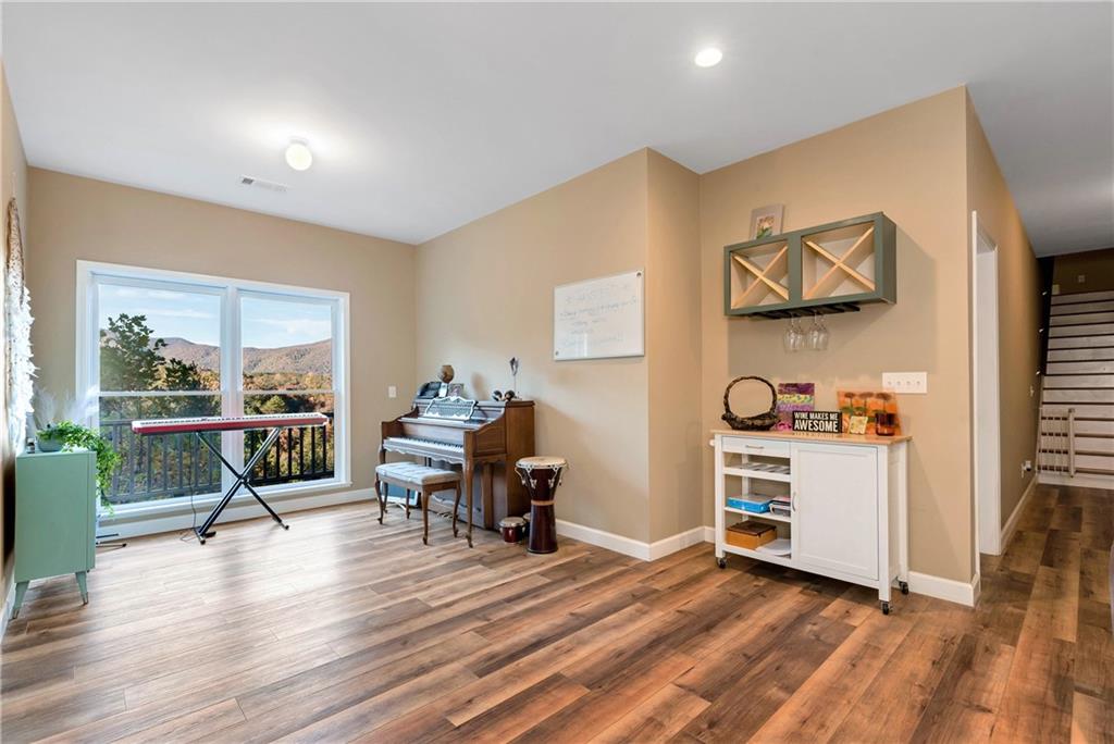 962 Woodbrier Sautee Nacoochee, GA 30571 - Photo 44 of 52 a living room with furniture and wooden floor