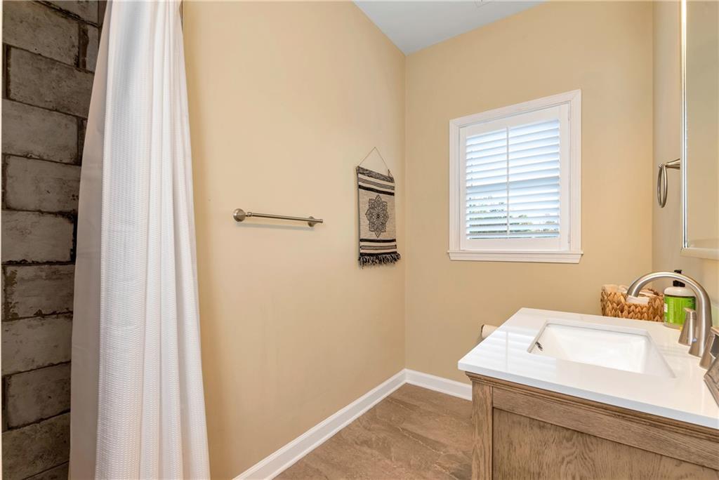962 Woodbrier Sautee Nacoochee, GA 30571 - Photo 46 of 52 a bathroom with a sink and a vanity