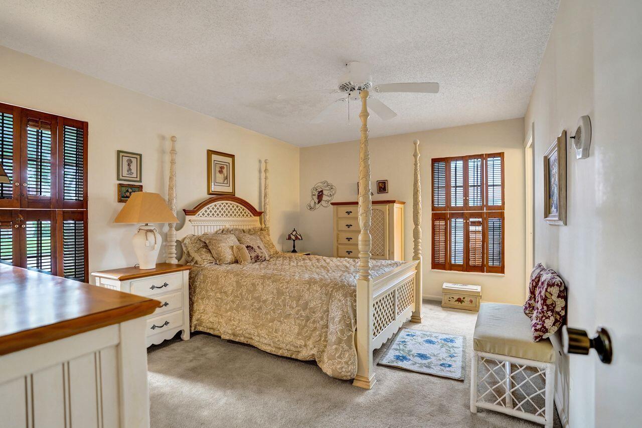 282 Cape Cod Circle, Unit A Lake Worth, FL 33467 - Photo 13 of 31 Primary Bedroom