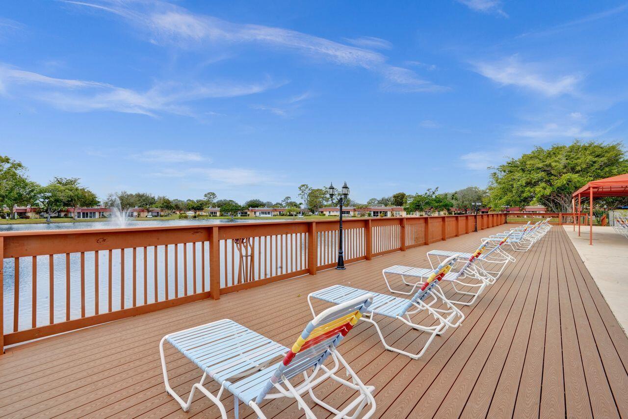 282 Cape Cod Circle, Unit A Lake Worth, FL 33467 - Photo 29 of 31 Communty Clubhouse Deck