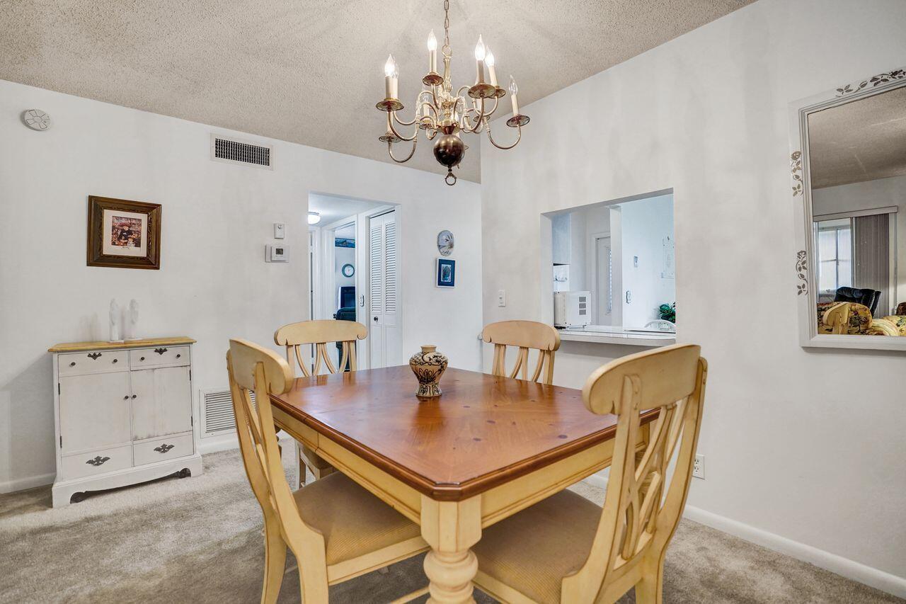 282 Cape Cod Circle, Unit A Lake Worth, FL 33467 - Photo 6 of 31 Dining Area