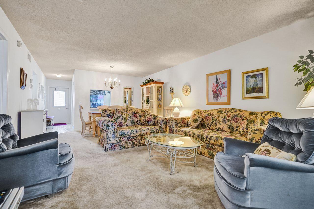 282 Cape Cod Circle, Unit A Lake Worth, FL 33467 - Photo 8 of 31 Living Room to Dining Room