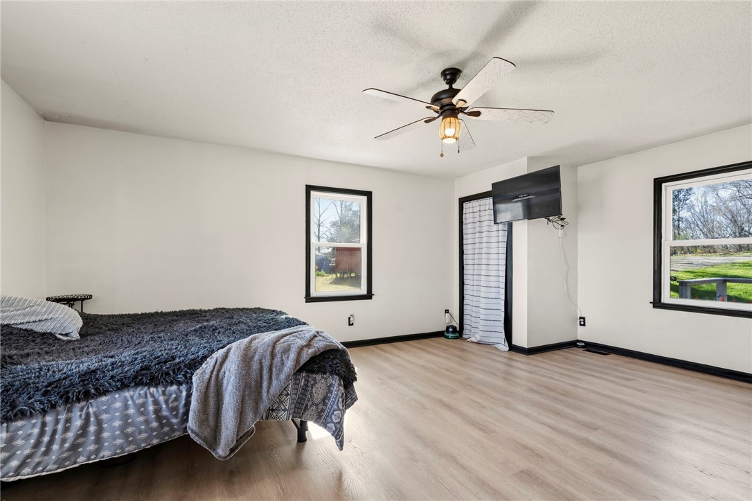 122 Latham Drive Anderson, SC 29621 - Photo 16 of 39 This spacious bedroom offers ample natural light and comfortable flooring, creating a serene personal retreat.