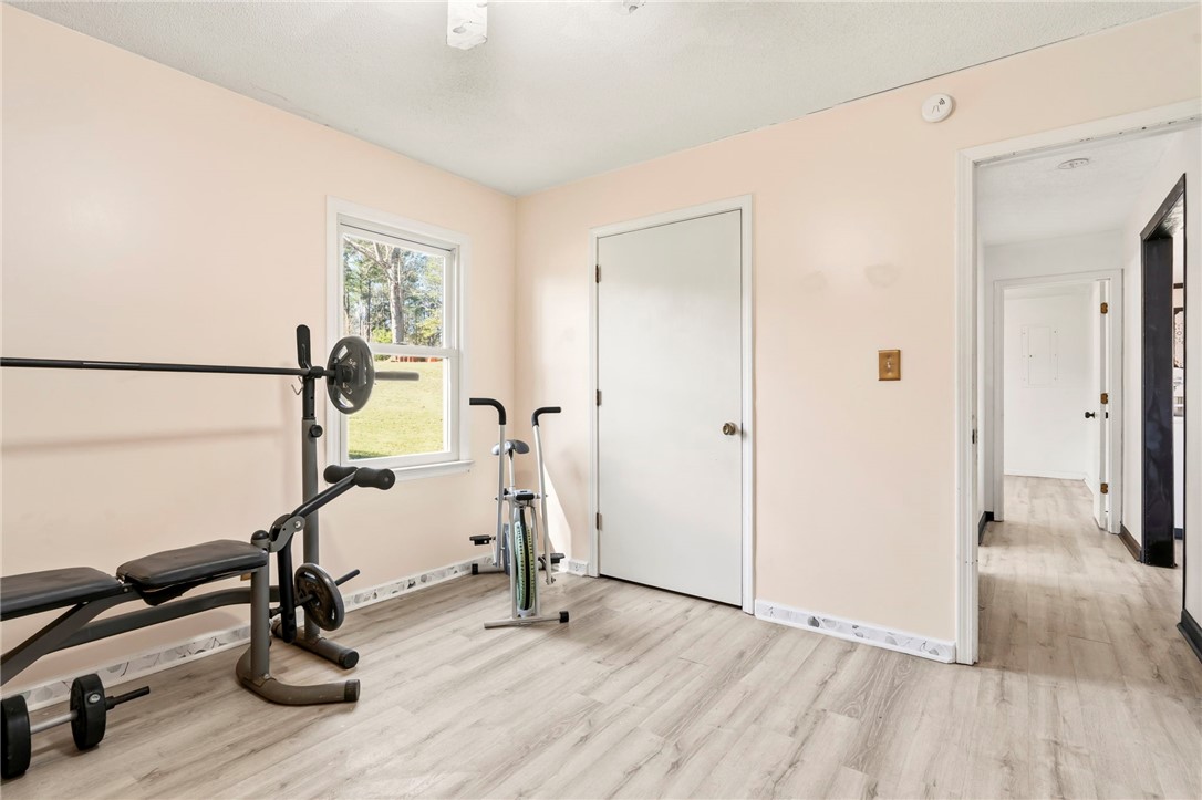 122 Latham Drive Anderson, SC 29621 - Photo 23 of 39 This versatile room offers a bright and functional space, perfect for an exercise area.