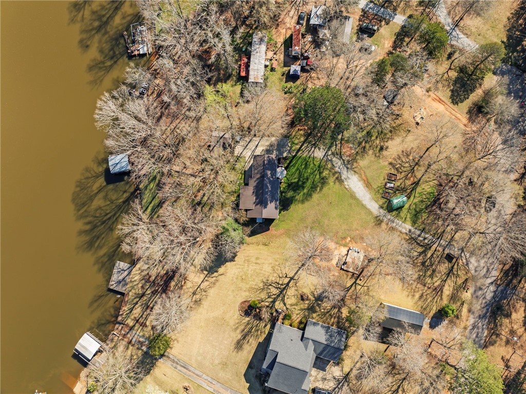 122 Latham Drive Anderson, SC 29621 - Photo 34 of 39 This elevated view captures a serene lakeside property with extensive water frontage.
