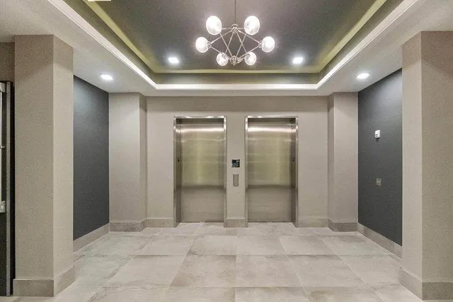 a room with wooden floor and gym equipment