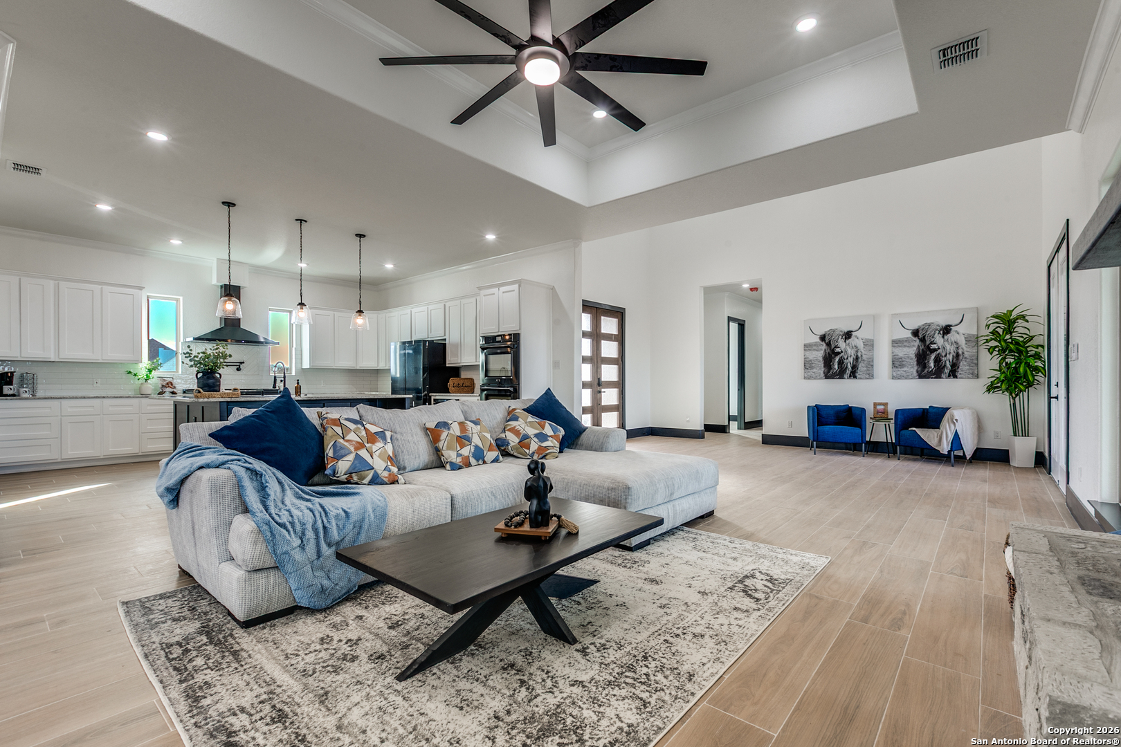 202 Venado Oaks Rio Medina, TX 78066 - Photo 9 of 37 a living room with furniture and kitchen view