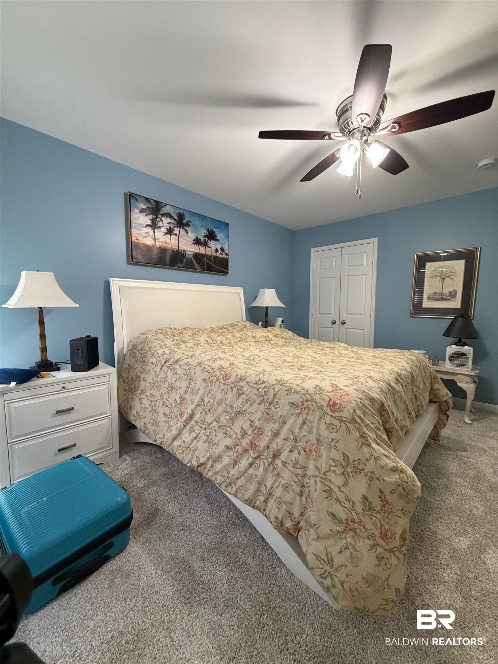 1517 Regency Road, Unit 71 Gulf Shores, AL 36542 - Photo 18 of 26 Carpeted bedroom with a closet and ceiling fan