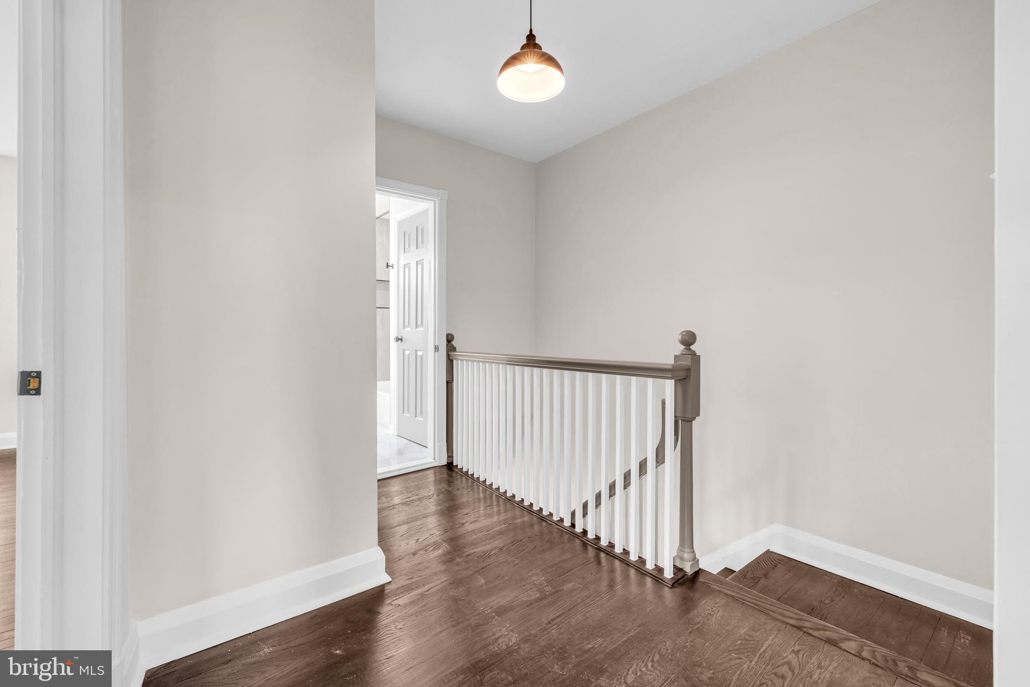 1513 Kingsway Road Baltimore, MD 21218 - Photo 11 of 47 upstairs hallway, pendant lighting