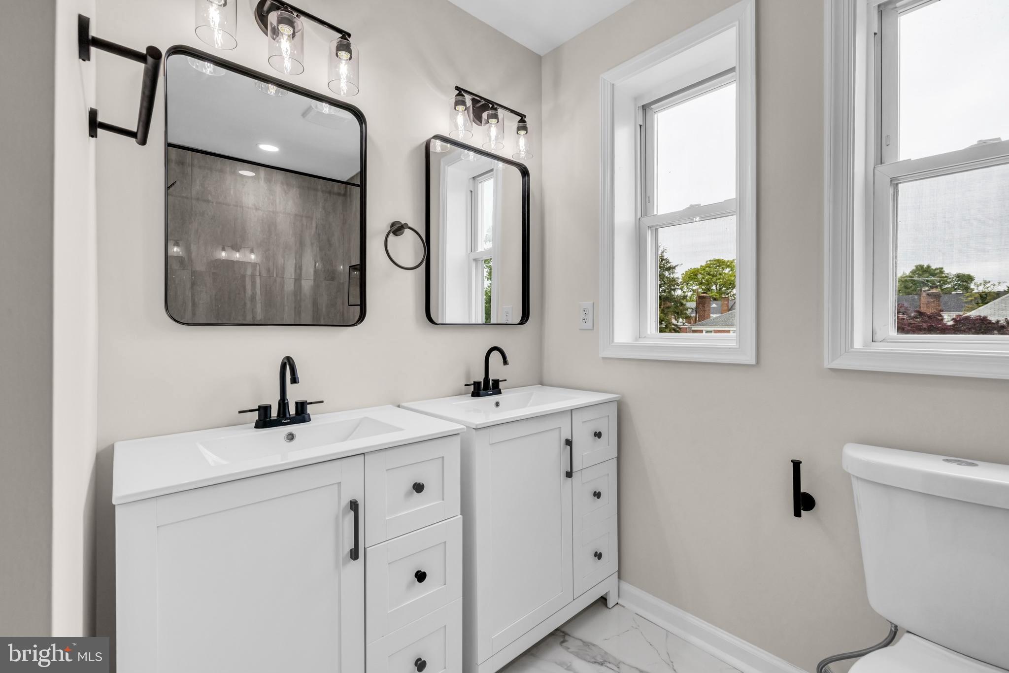 1513 Kingsway Road Baltimore, MD 21218 - Photo 13 of 47 master bath double sinks, vanity lighting