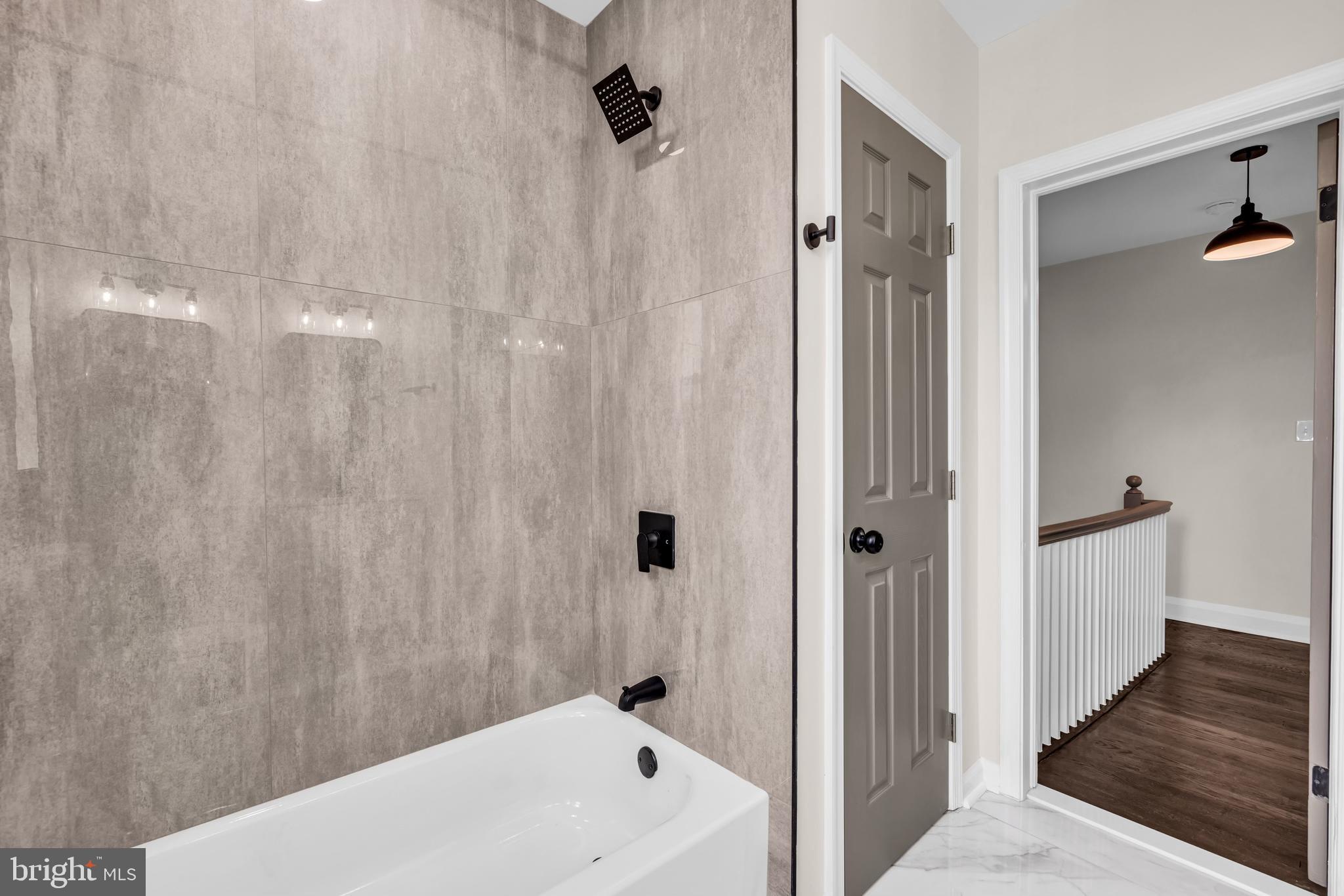 1513 Kingsway Road Baltimore, MD 21218 - Photo 14 of 47 ceramic shower master bath