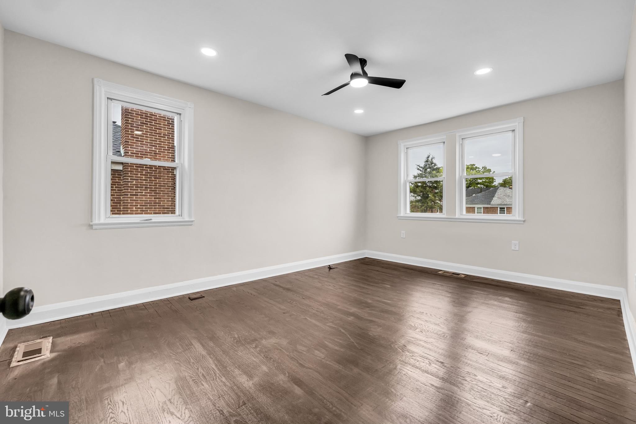 1513 Kingsway Road Baltimore, MD 21218 - Photo 17 of 47 master bedroom original hardwood floors
