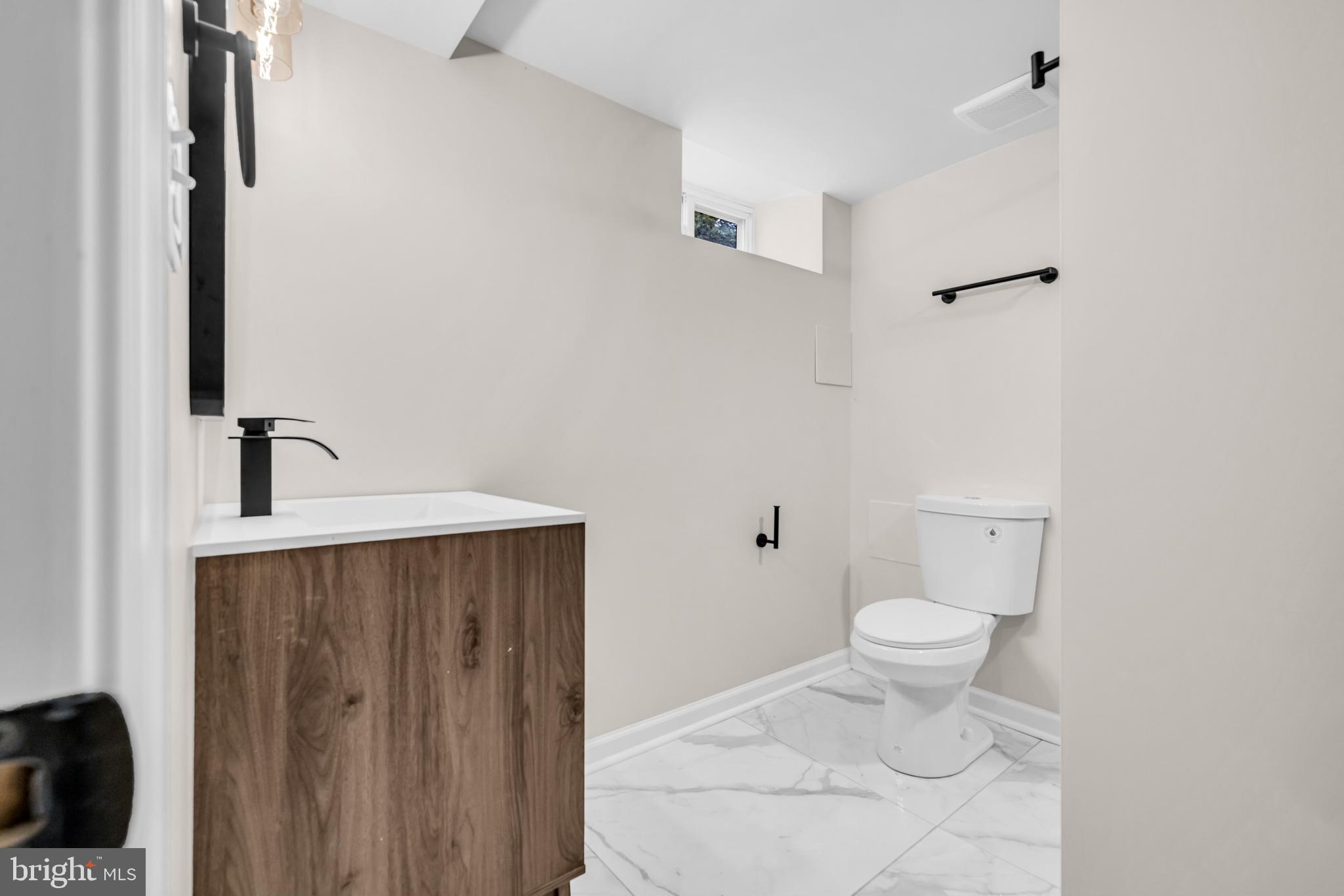 1513 Kingsway Road Baltimore, MD 21218 - Photo 25 of 47 Full bathroom in the basement, ceramic floors