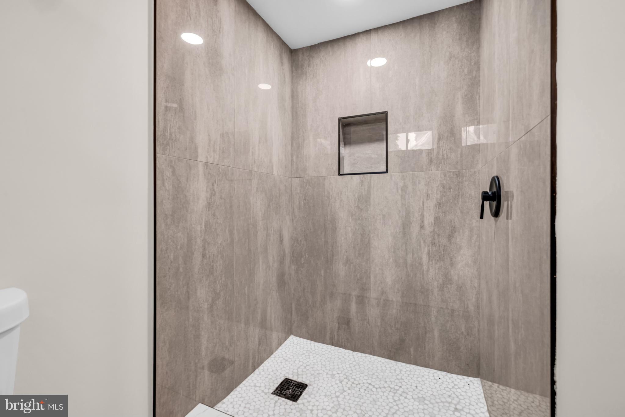 1513 Kingsway Road Baltimore, MD 21218 - Photo 26 of 47 ceramic shower in the basement