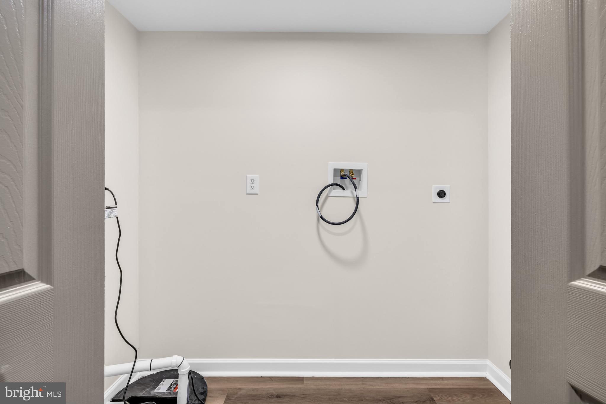1513 Kingsway Road Baltimore, MD 21218 - Photo 29 of 47 Laundry room with sump pump