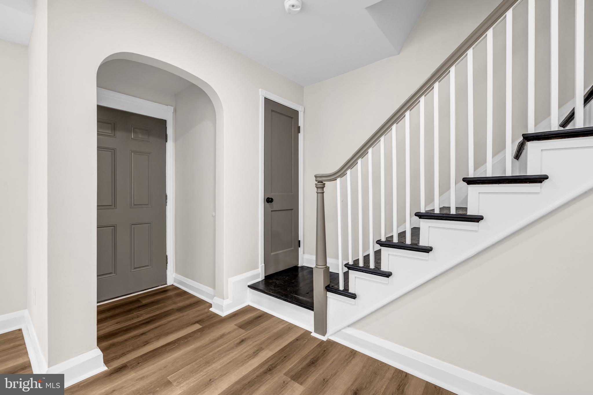 1513 Kingsway Road Baltimore, MD 21218 - Photo 9 of 47 living area with step upstairs
