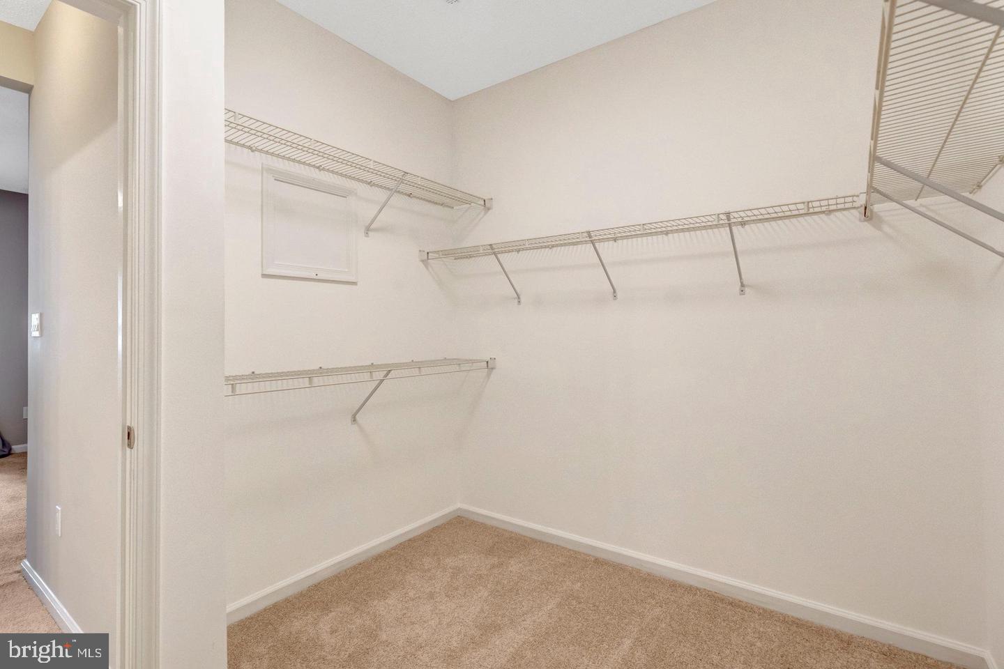 1701 Lake Shore Crest Drive, Unit 11 Reston, VA 20190 - Photo 15 of 33 a view of a room with racks on the wall