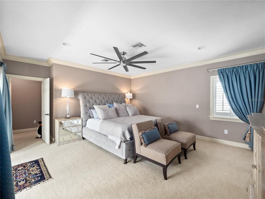 1208 Radiant Street Reunion, FL 34747 - Photo 29 of 47 a bed room with a bed and a couch