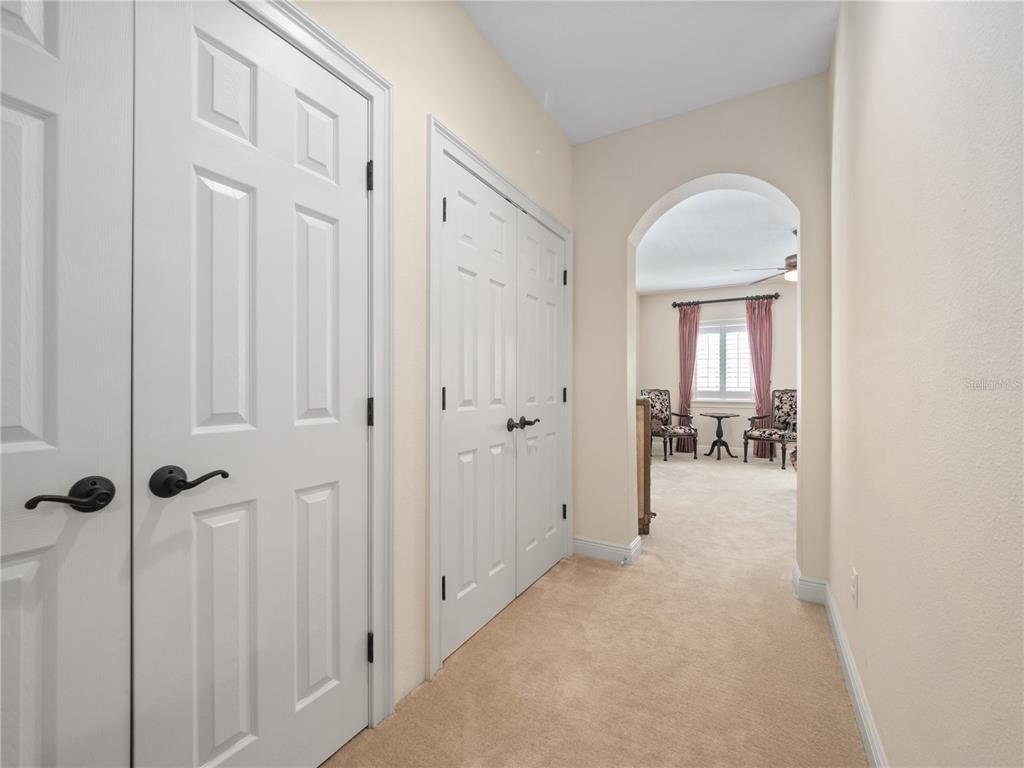 1208 Radiant Street Reunion, FL 34747 - Photo 38 of 47 a view of a livingroom with a hallway and a livingroom
