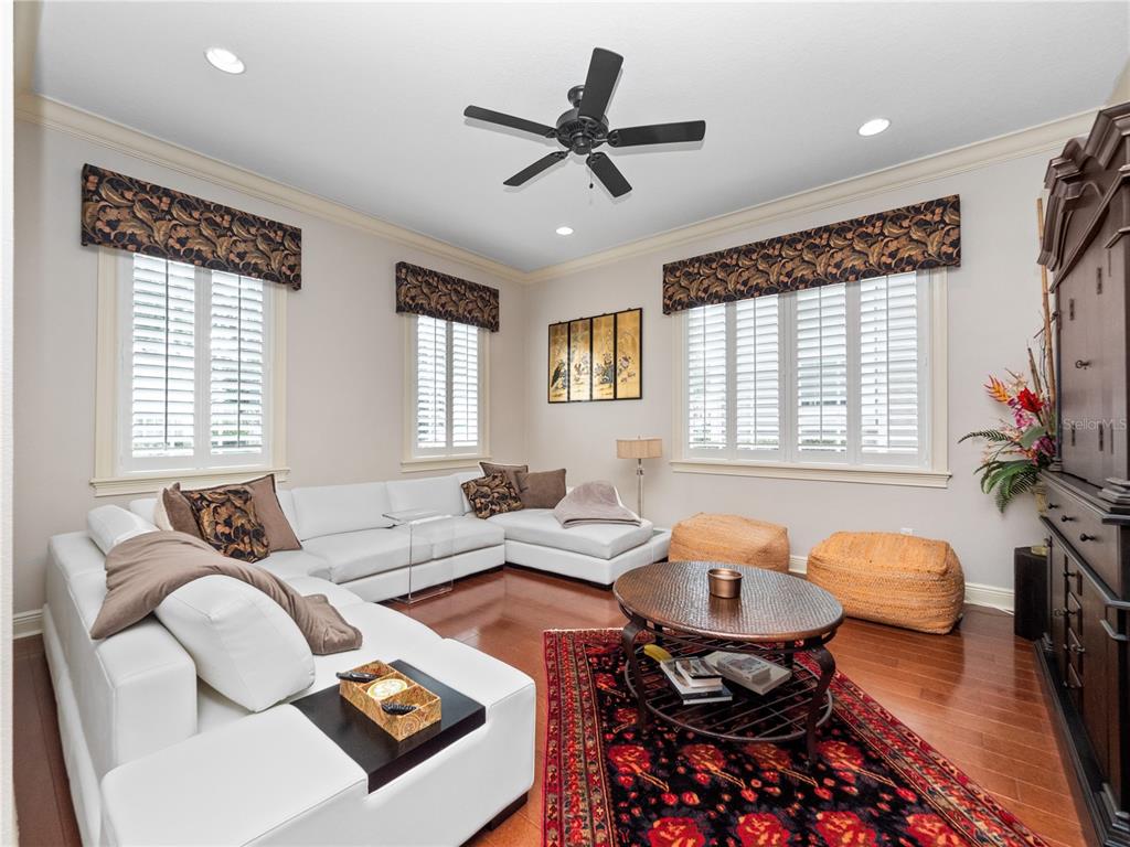 1208 Radiant Street Reunion, FL 34747 - Photo 7 of 47 a living room with furniture and a window