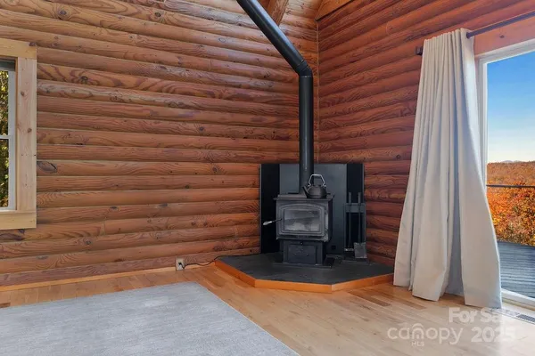 a view of a patio with wooden floor and roof