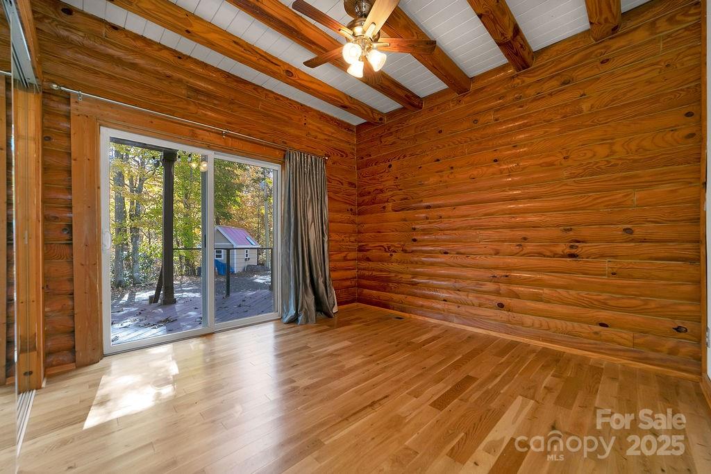 85 Ridge Road Rosman, NC 28772 - Photo 17 of 48 a view of a patio with wooden floor and roof