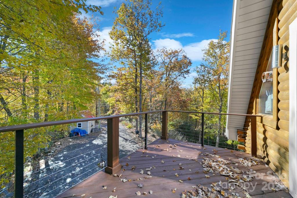 85 Ridge Road Rosman, NC 28772 - Photo 30 of 48 a view of a pathway with a wrought fence