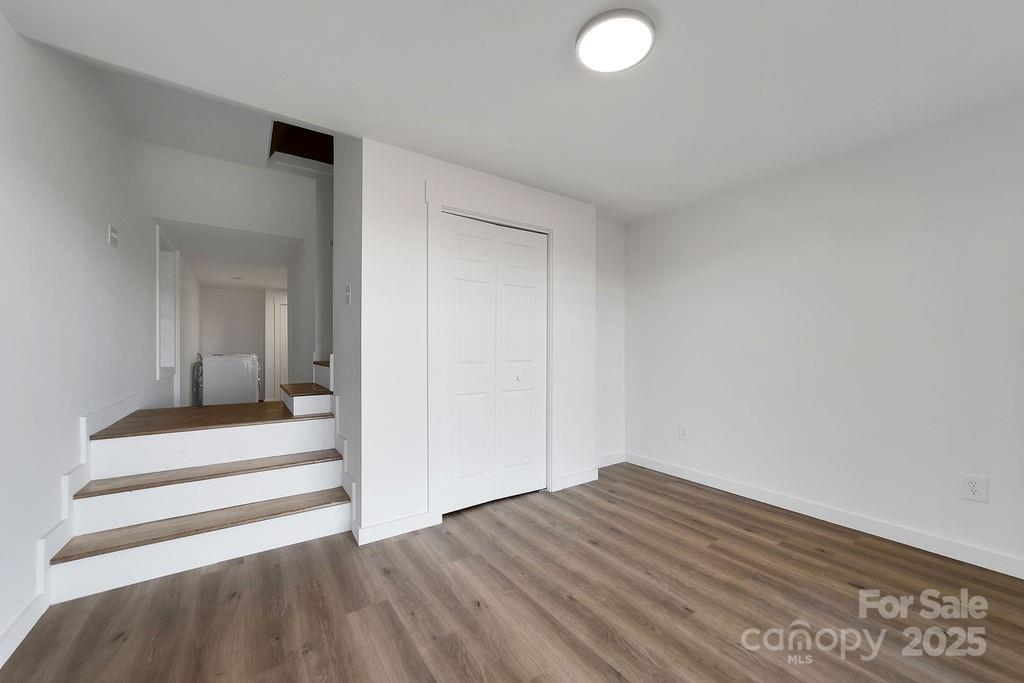 85 Ridge Road Rosman, NC 28772 - Photo 31 of 48 a view of wooden floor and windows in a room
