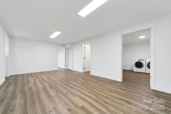 a bathroom with a bathtub and a sink