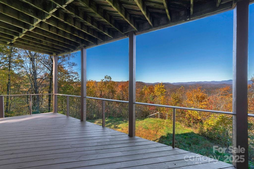 85 Ridge Road Rosman, NC 28772 - Photo 38 of 48 a view of a balcony with wooden floor