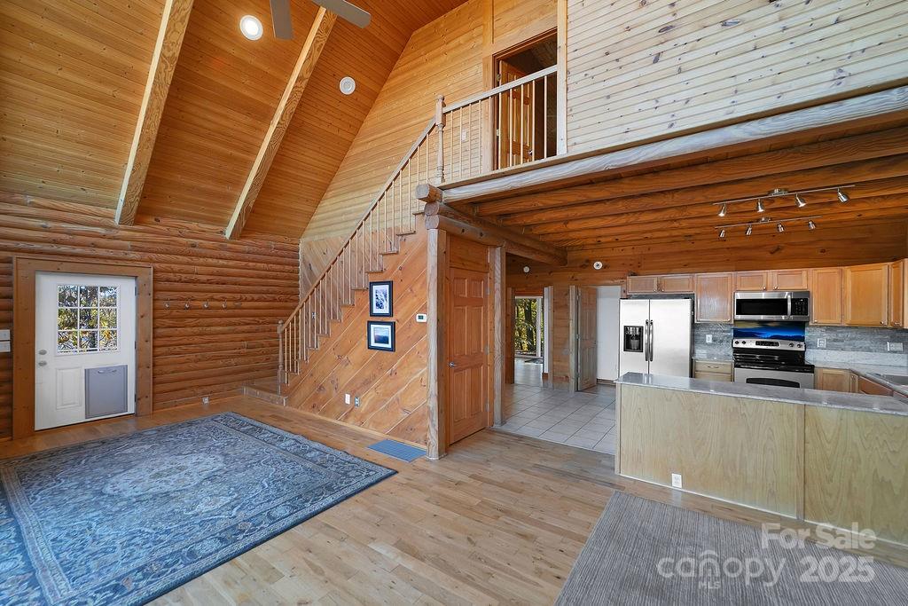 85 Ridge Road Rosman, NC 28772 - Photo 10 of 48 a view of a living room with stainless steel appliances wooden floor and floors